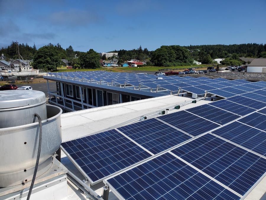 A roof with a lot of solar panels on it